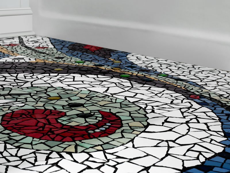 Photo of custom mosaic floor abstract design detail near bathtub in bathroom renovation