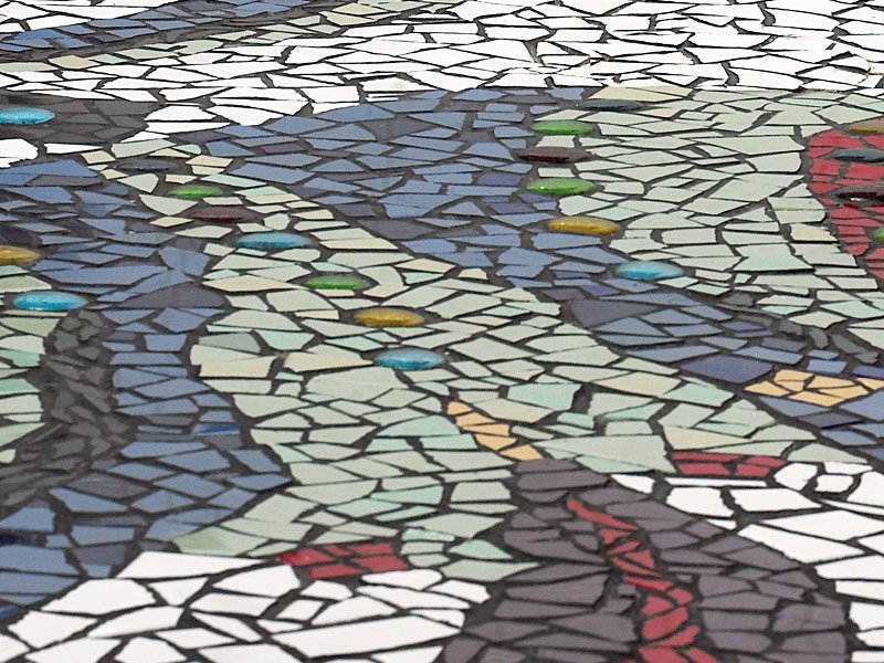 Photo of custom bathroom mosaic floor abstract organic design close up detail